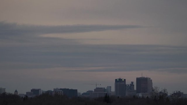 Day to night time lapse of Winnipeg skyline in April.