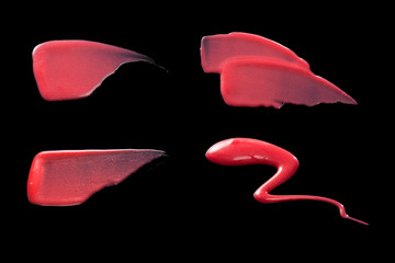 Texture and Stroke of Red Lip Gloss on a Black Background