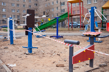 Fototapeta na wymiar Playground is closed for prevention of coronavirus. No children on playground
