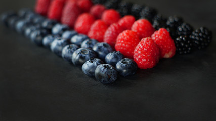 blueberries, raspberries and blackberries on slate, berries, summer crop