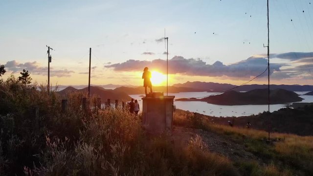 Aerial, drone shot over Mount Tapyas, towards the sunset, on Coron island, in Philippines, Asia
