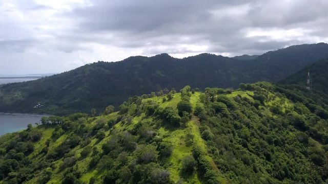 aerial footage by drone, looks very beautiful scenery, looks hills and beaches