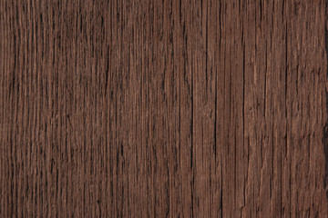 Naklejka premium dark brown wooden texture background