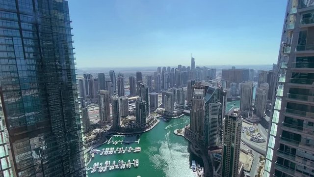 View of Dubai Marina from a high building on a sunny day in Dubai, Emirates