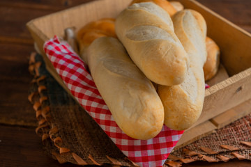 Freshly baked wholemeal bread on wooden board with sunflower seeds