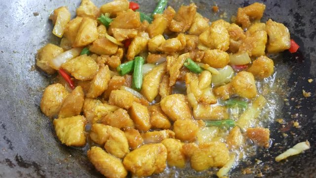 Turmeric fried chicken. The chicken is cut into small pieces and fried with turmeric. Fry in a pan using hot cooking oil. The origin of this dish is from Thailand.