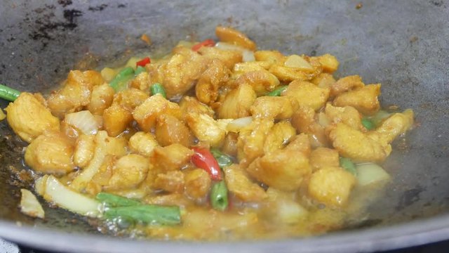 Turmeric fried chicken. The chicken is cut into small pieces and fried with turmeric. Fry in a pan using hot cooking oil. The origin of this dish is from Thailand.
