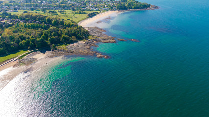 Aerial view of Coast of Irish Sea in Helen's Bay, Northern Ireland. View from above on beach in sunny day