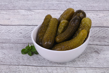Pickled cucumbers heap in the bowl