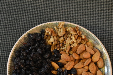 bowl of mixed nuts and raisins