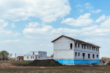 Building house (uncompleted) - with blue sky