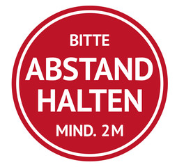 Round warning sign in German about keeping social distance during corona virus pandemic outbreak. Bitte mind. 2m abstand halten. Please keep at least 2 m away. Suitable for stickers, shields, posters.