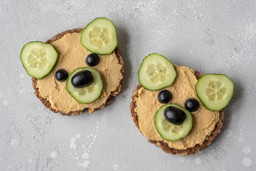 Funny bear toast with cucumber and hummus toasts