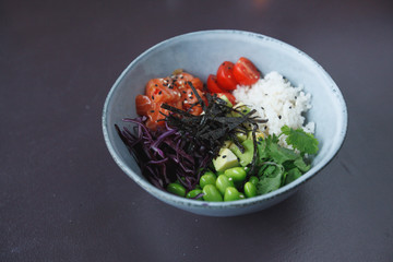 salad bowl with salmon, tomatoes and beans