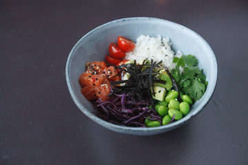 salad bowl with salmon, tomatoes and beans