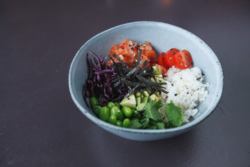 salad bowl with salmon, tomatoes and beans