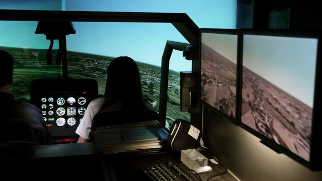 MS PAN Student pilots in helicopter flight simulator