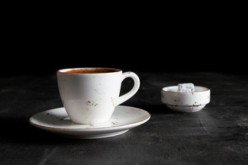 Turkish Coffee with turkish delight on black wood table. coffee time, time to rest 