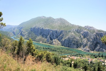 Fototapeta na wymiar mountains and the Cetina river, Omis, Croatia