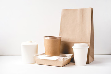 Various packaging for food delivery on white background.