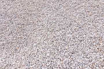 Scree is used in the construction industry background and texture. Small road stone background, Granite gravel texture.