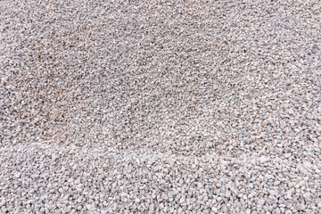 Scree is used in the construction industry background and texture. Small road stone background, Granite gravel texture.