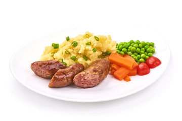 Bangers and mash, traditional british cuisine, isolated on white background