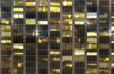 Fototapeta na wymiar city buildings windows by night
