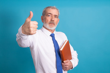 businessman with tie and agenda or book isolated on background