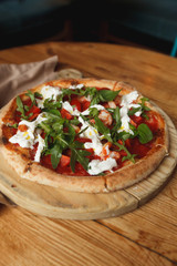 pizza on a wooden board