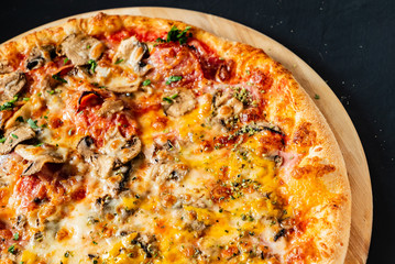 pizza on the black background