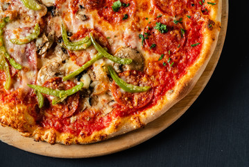 pizza on the black background