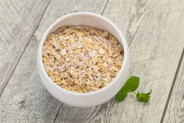 Raw oats in the bowl