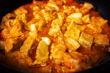 Fried pork in a pan