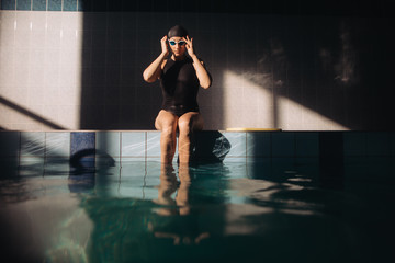 Female swimming instructor in the swimming pool