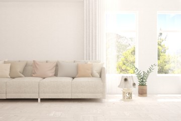 White living room with sofa and summer landscape in window. Scandinavian interior design. 3D illustration