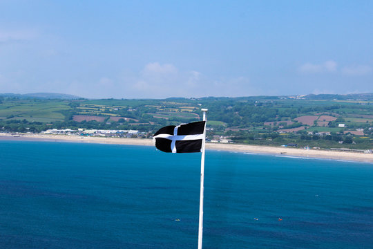 Cornish flag with sea in background