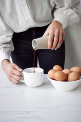 Woman pouring a coffee © 4Media Creations