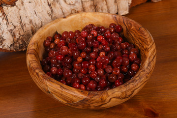 Traditional soaked cowberry in the bowl