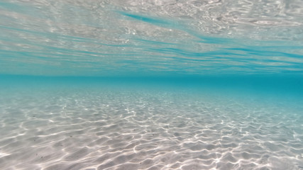 Fototapeta na wymiar Underwater mediterranean paradise beach with emerald - turquoise sea