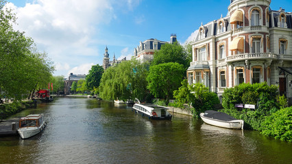 Fototapeta premium Traditional canal in old center of Amsterdam, Holland