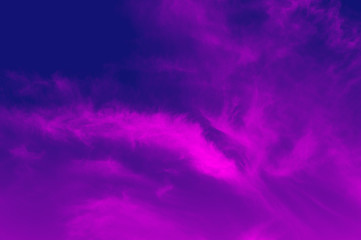 Pink cloud on blue background 