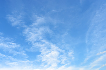Light translucent cirrus clouds high in a blue spring or summer sky on a sunny day. Meteorology, weather and different cloud types.