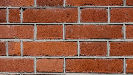 Abstract brick wall background, closeup. Red brick wall texture.