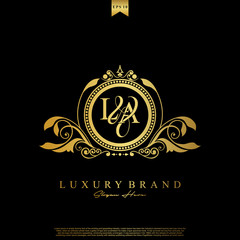 Logo Initial letter LA luxury vector mark, gold color elegant classical symmetric curves decor.