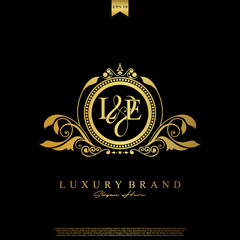 Logo Initial letter LE luxury vector mark, gold color elegant classical symmetric curves decor.