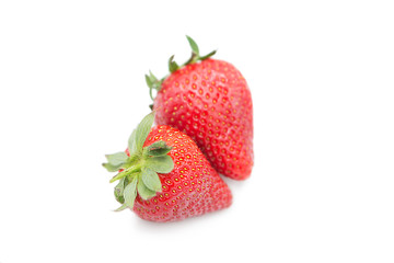 Ripe fresh organic strawberries isolated on white background.