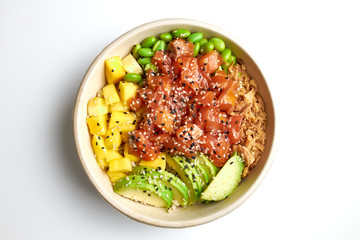 Poke salad with salmon, avocado, mango, edamame, crispy onion and sesame seeds.