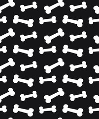 Vector seamless pattern of white hand drawn doodle sketch cartoon bone isolated on black background