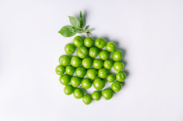 green plums on white ground